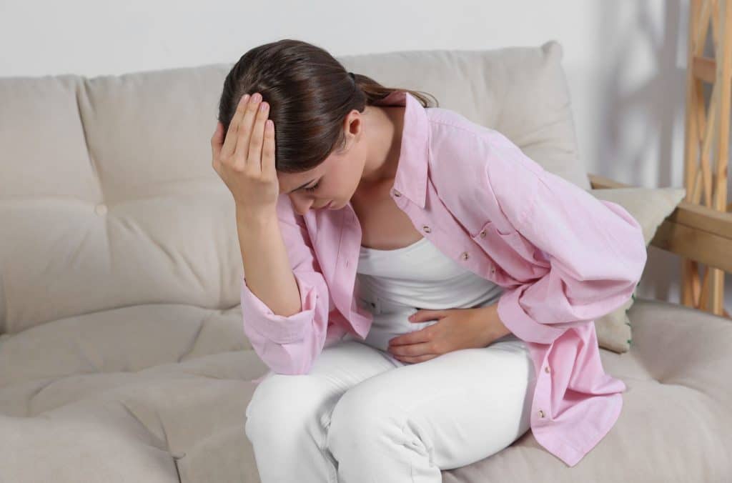 A woman suffering from pelvic floor dysfunction.